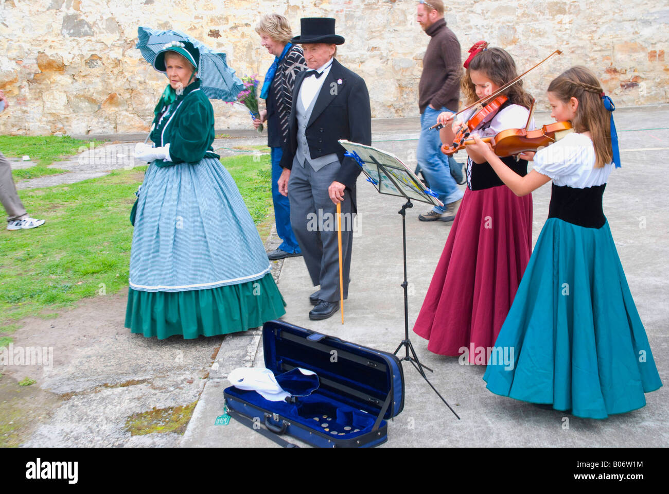 Children busking in period costume at a historic reenactment in Hobart Tasmania Stock Photo