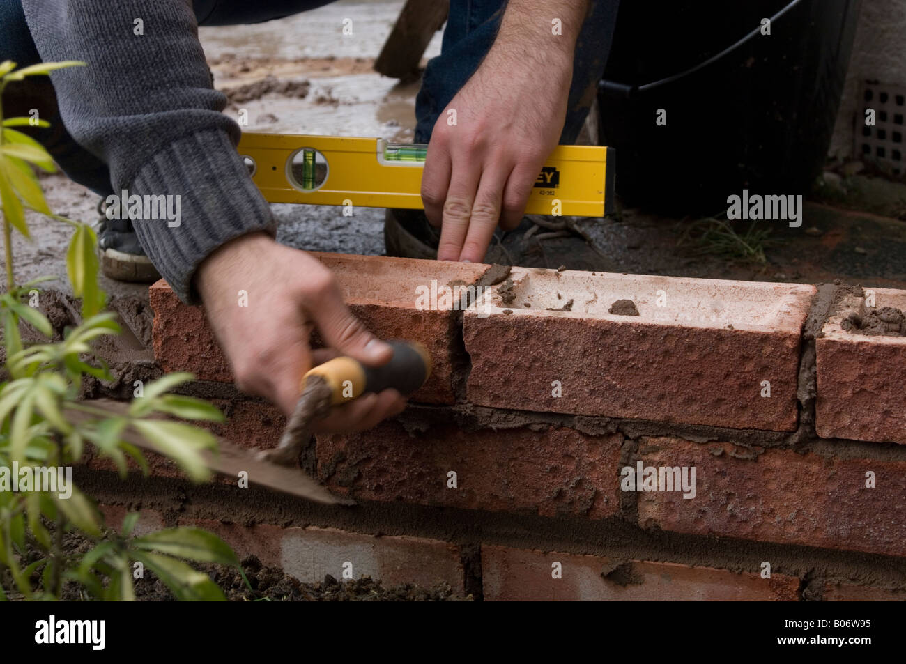DIY How to build a brick wall Stock Photo Alamy