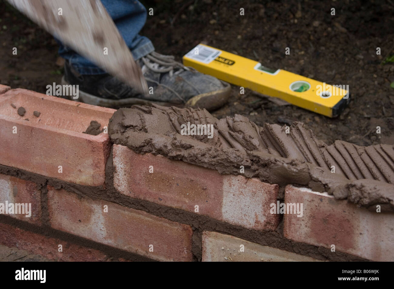 DIY How to build a brick wall Stock Photo Alamy