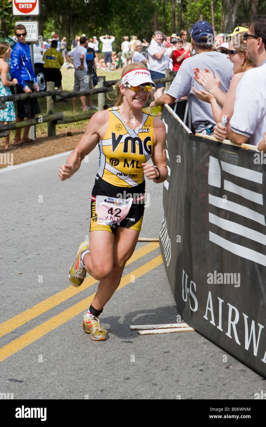 Female Triathlon Runner at the Disney 70.3 Mile Ironman in Orlando Florida USA U S Fl Stock