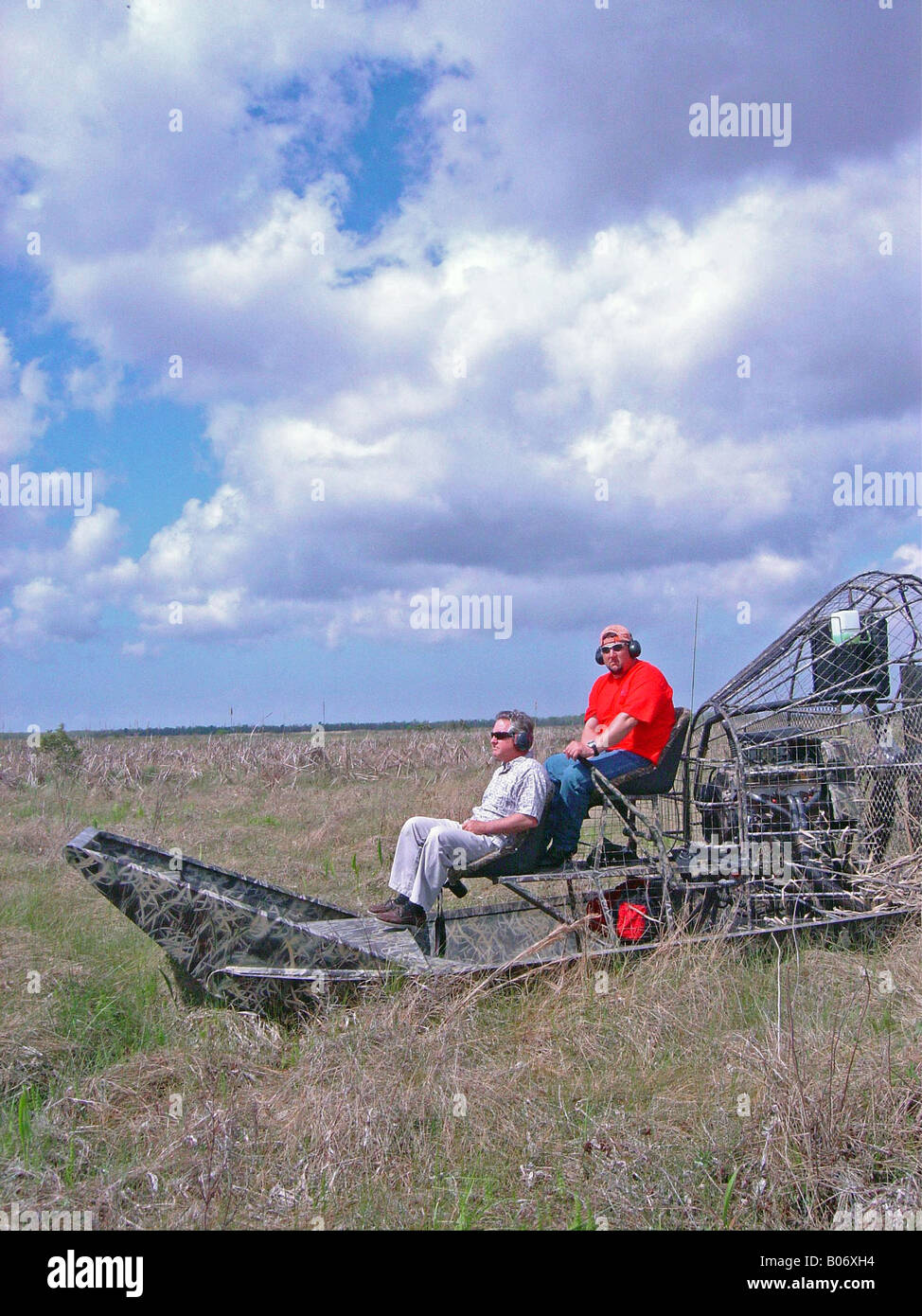 Airboaters in marsh Stock Photo