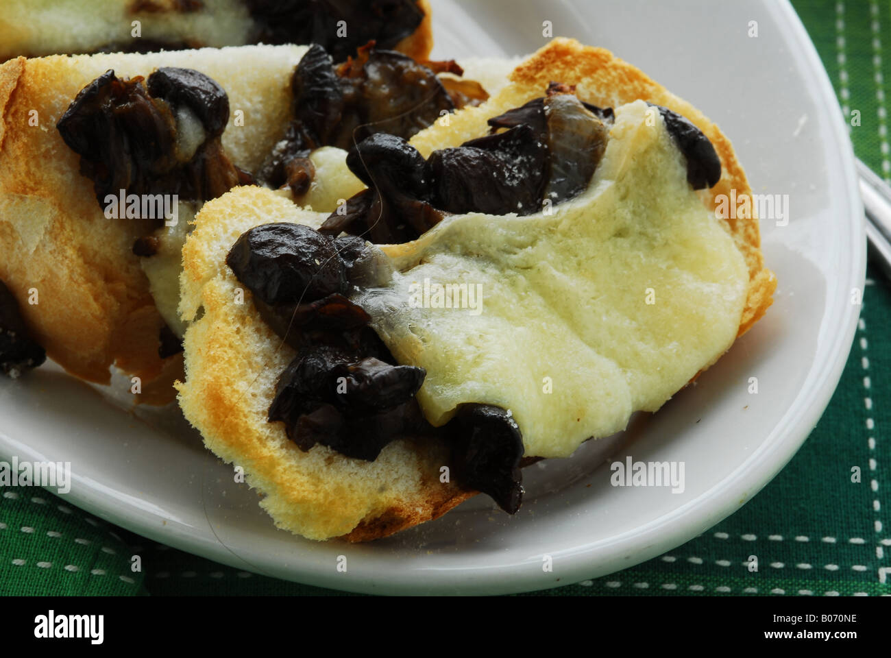 Canape with cheese and honey mushrooms - Appetizers Trentino Alto Adige - Italian kitchen Stock Photo