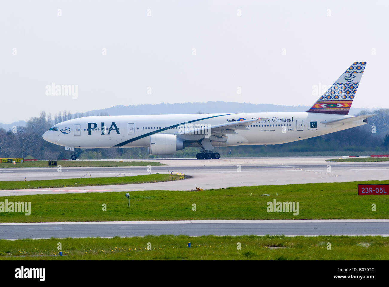 Pakistan Internation Airlines PIA Boeing 777 [777-240 ER] Taxiing After Landing at Manchester Ringway Airport England UK Stock Photo