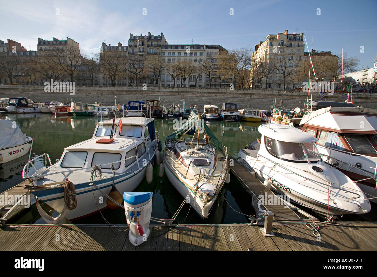 Canal St Martin with boats, Paris France. blue sky, spring, horizontal Stock Photo
