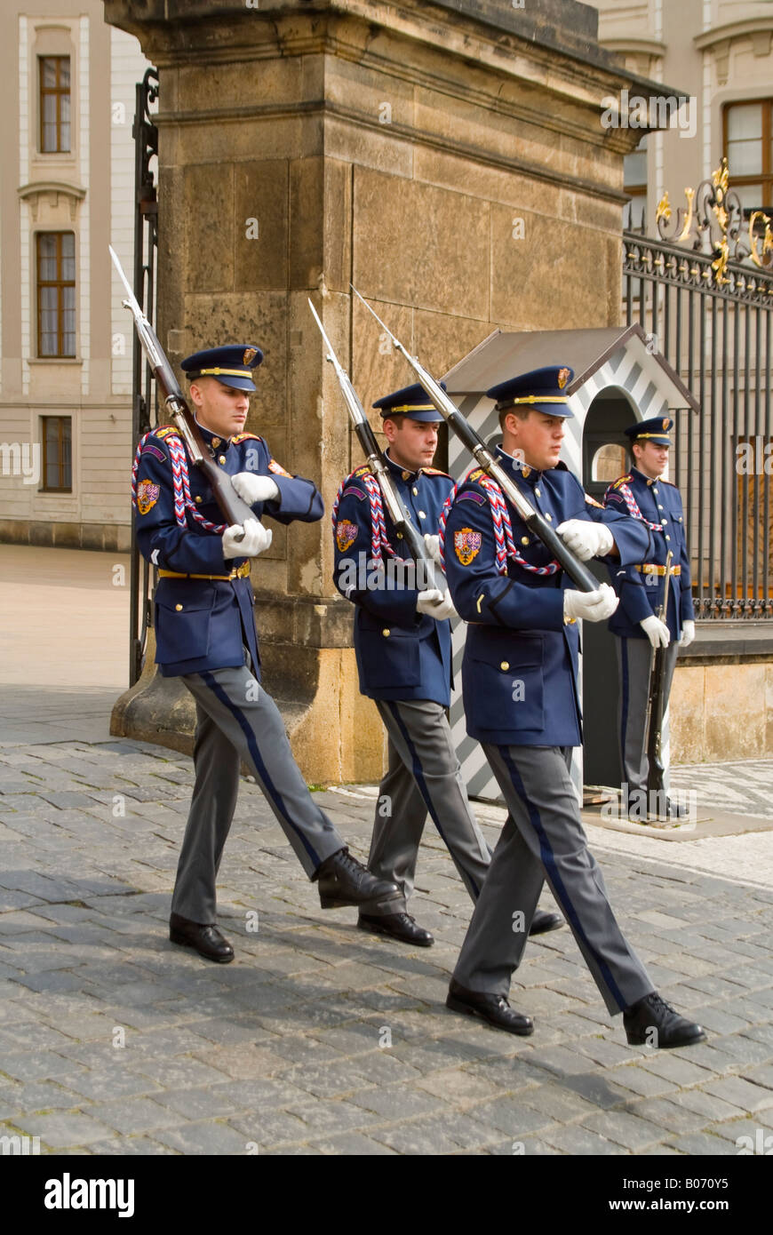 Vertical close up of the Changing of the Castle Guards of the Czech Armed Forces outside Prague Castle in the sunshine. Stock Photo