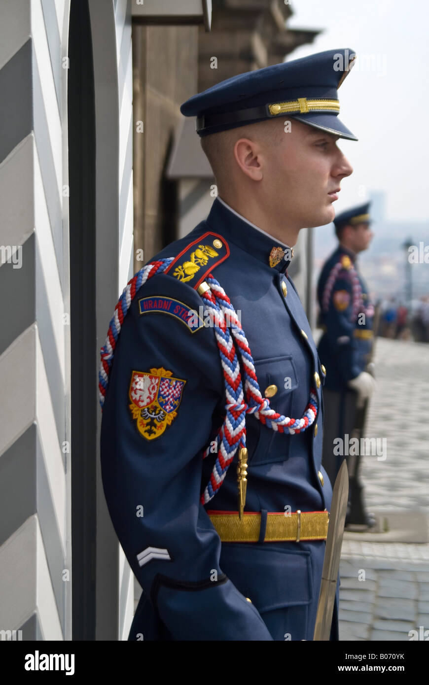 Vertical close up of Castle Guards of the Czech Armed Forces on duty outside Prague Castle 'Prazsky Hrad' in the sunshine. Stock Photo