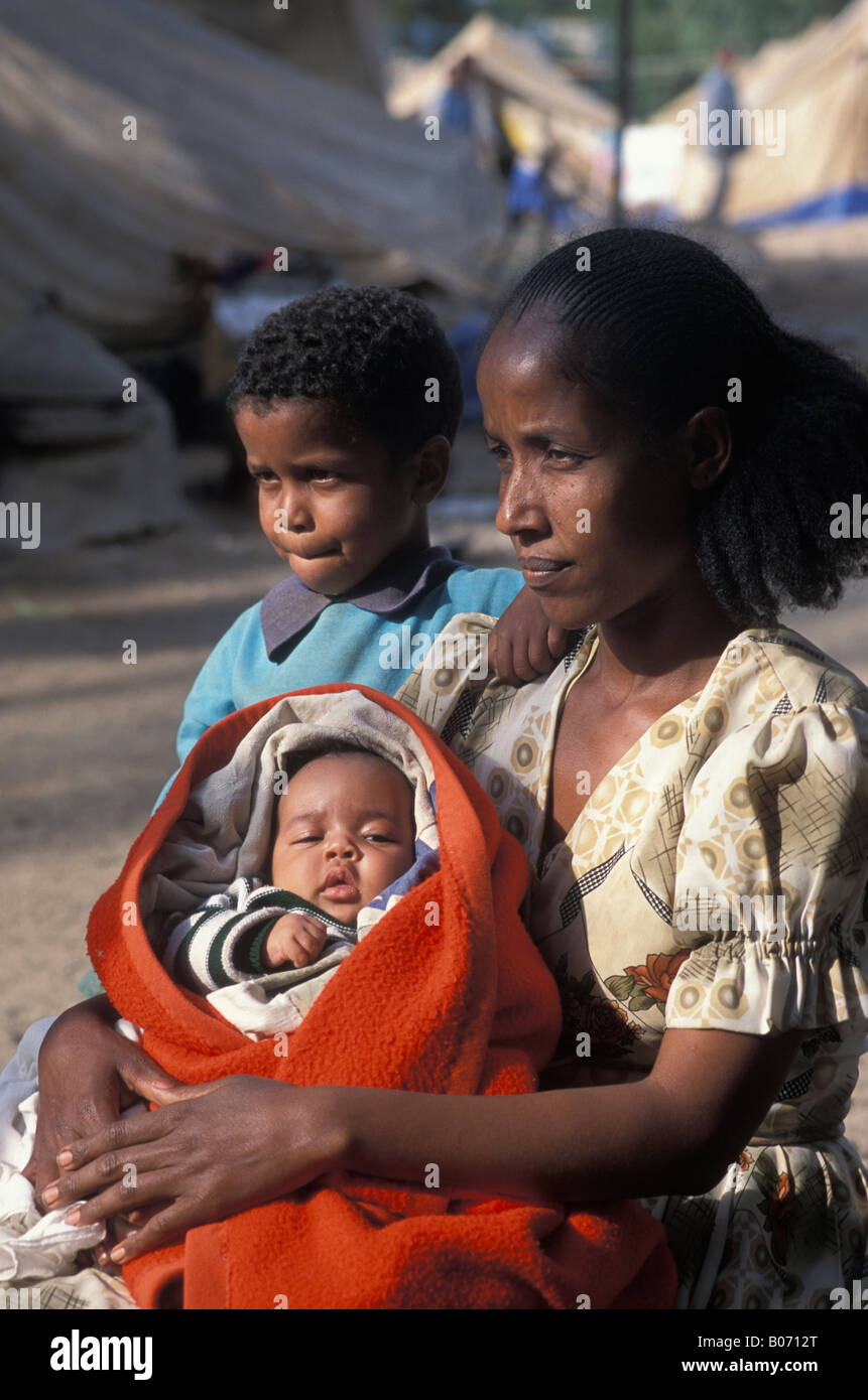 Eritrean mother and her two children at a refugee camp in Eritrea during border dispute with Ethiopia Stock Photo
