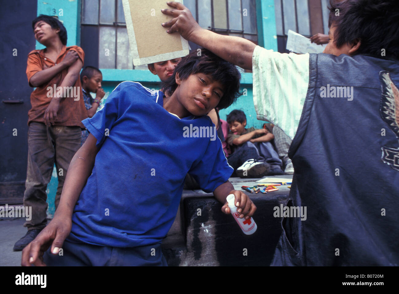 Guatemalan street children sniffing glue and solvents in Guatemala City