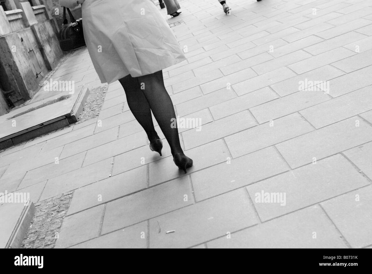 Woman wearing skirt high heels hi-res stock photography and images - Alamy