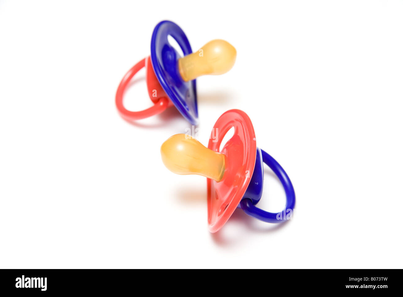 Babies dummies or pacifiers isolated on a white studio background Stock Photo Alamy