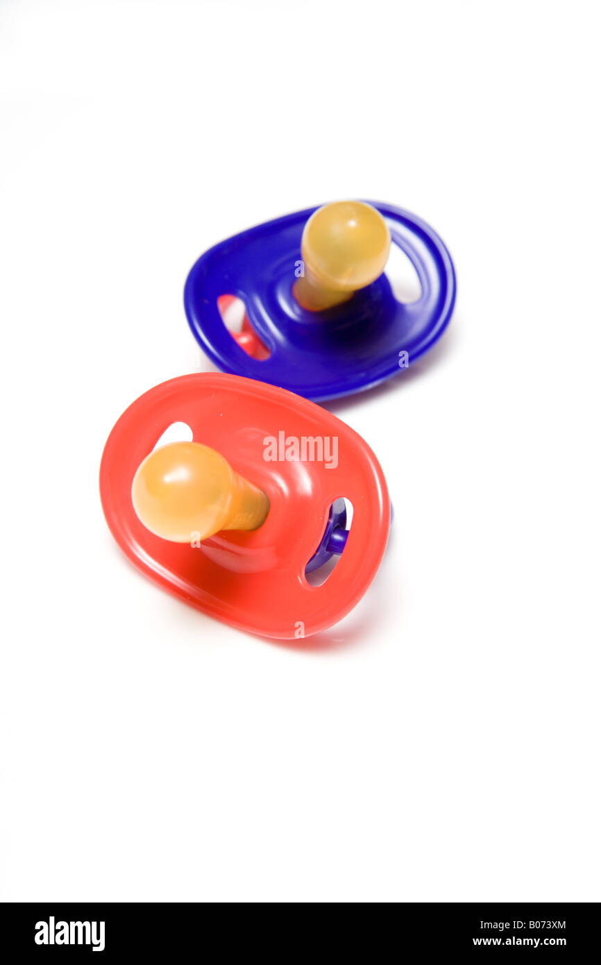 Babies dummies or pacifiers isolated on a white studio background Stock Photo Alamy