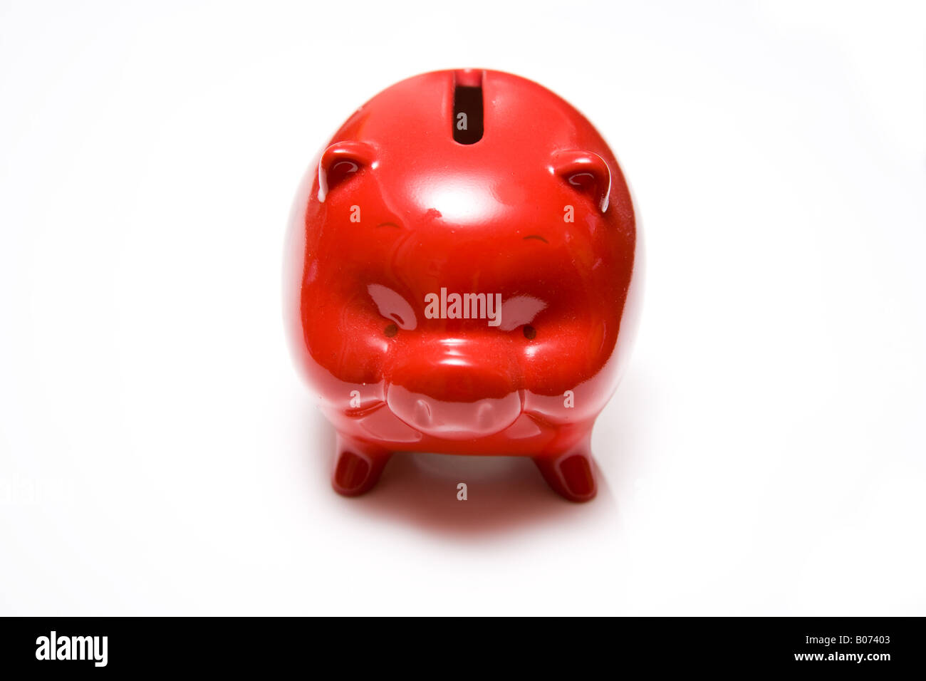 Piggy bank style money box isolated on a white studio background Stock ...