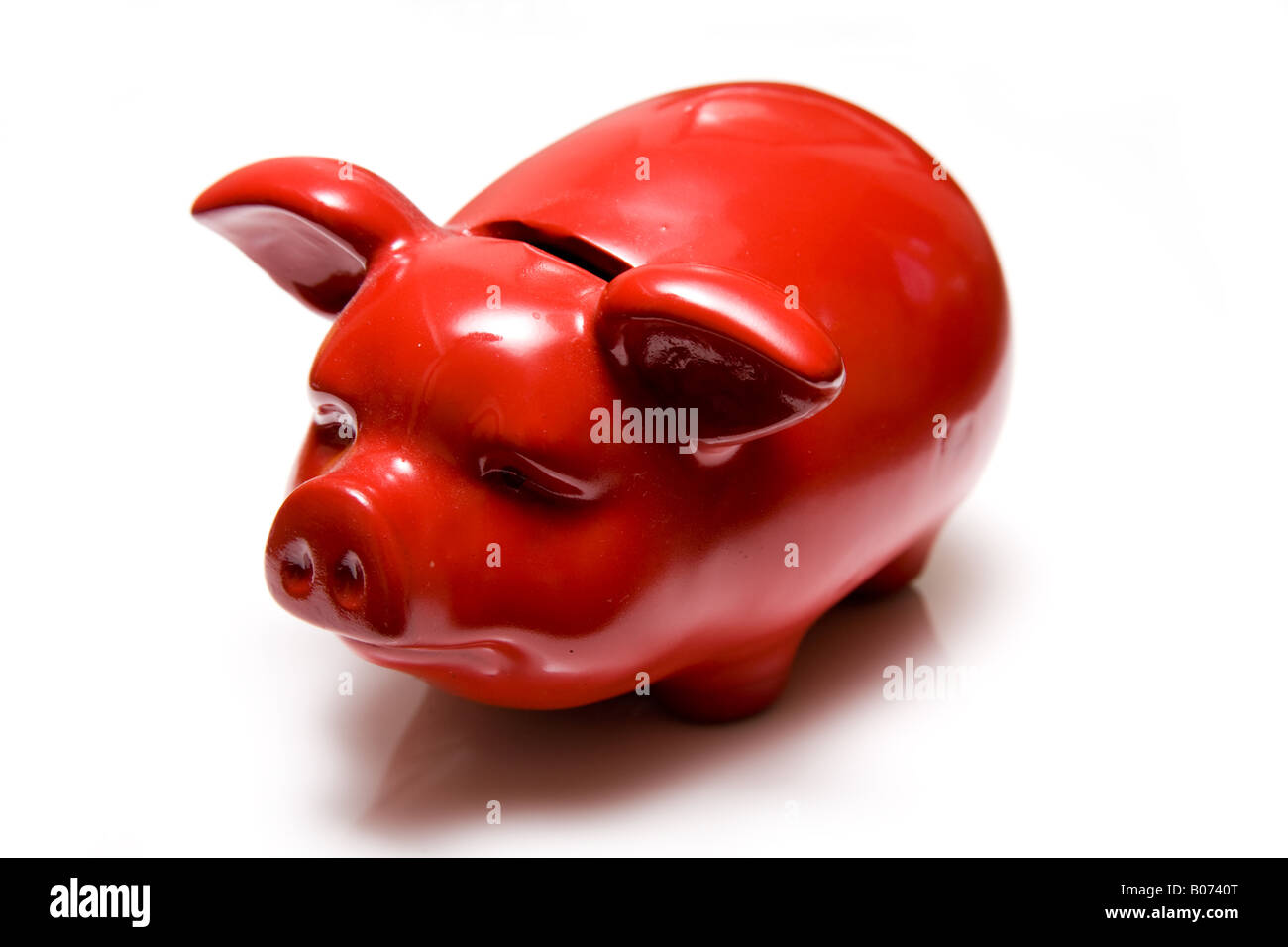 Piggy bank style money box isolated on a white studio background Stock ...