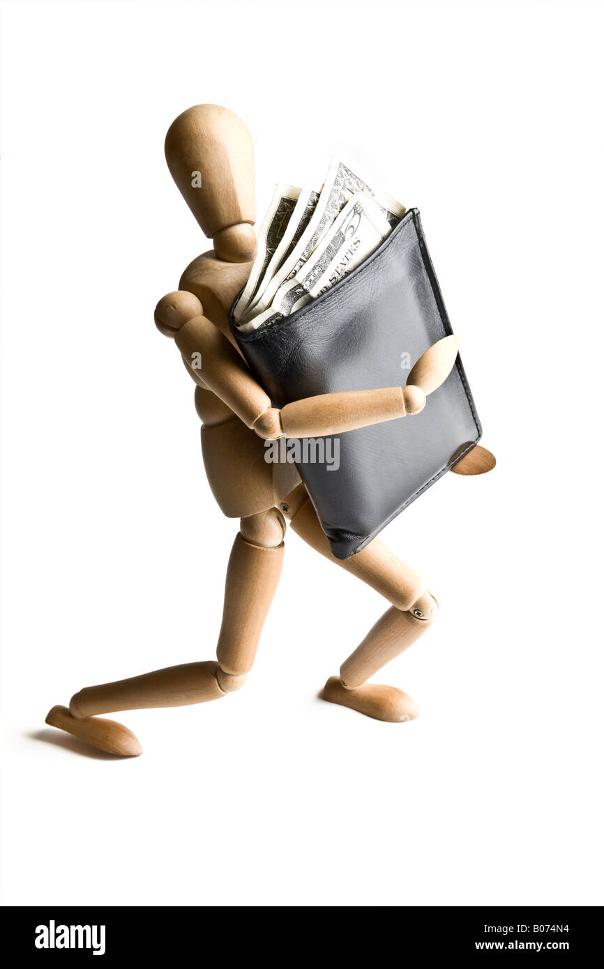 Manikin carrying a wallet full of money Stock Photo