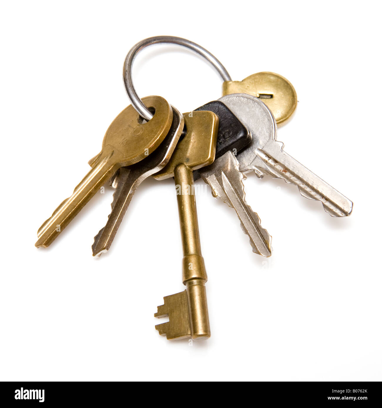 Bunch of keys isolated on a white studio background. Stock Photo