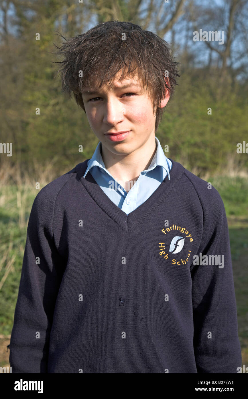 Teenage boy in navy blue school uniform Stock Photo - Alamy