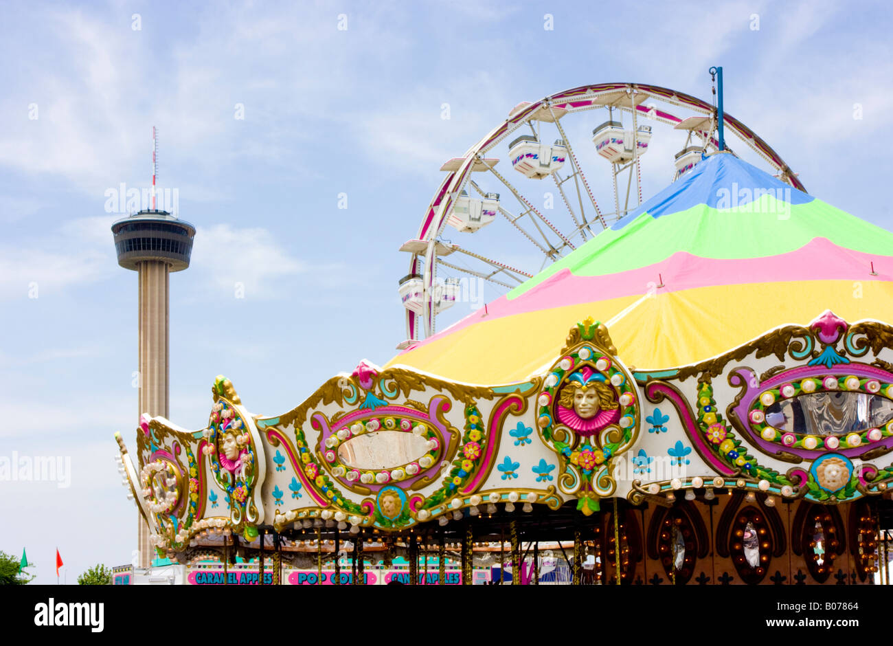 Fiesta carnival rides and Tower of Americas in San Antonio Texas Stock