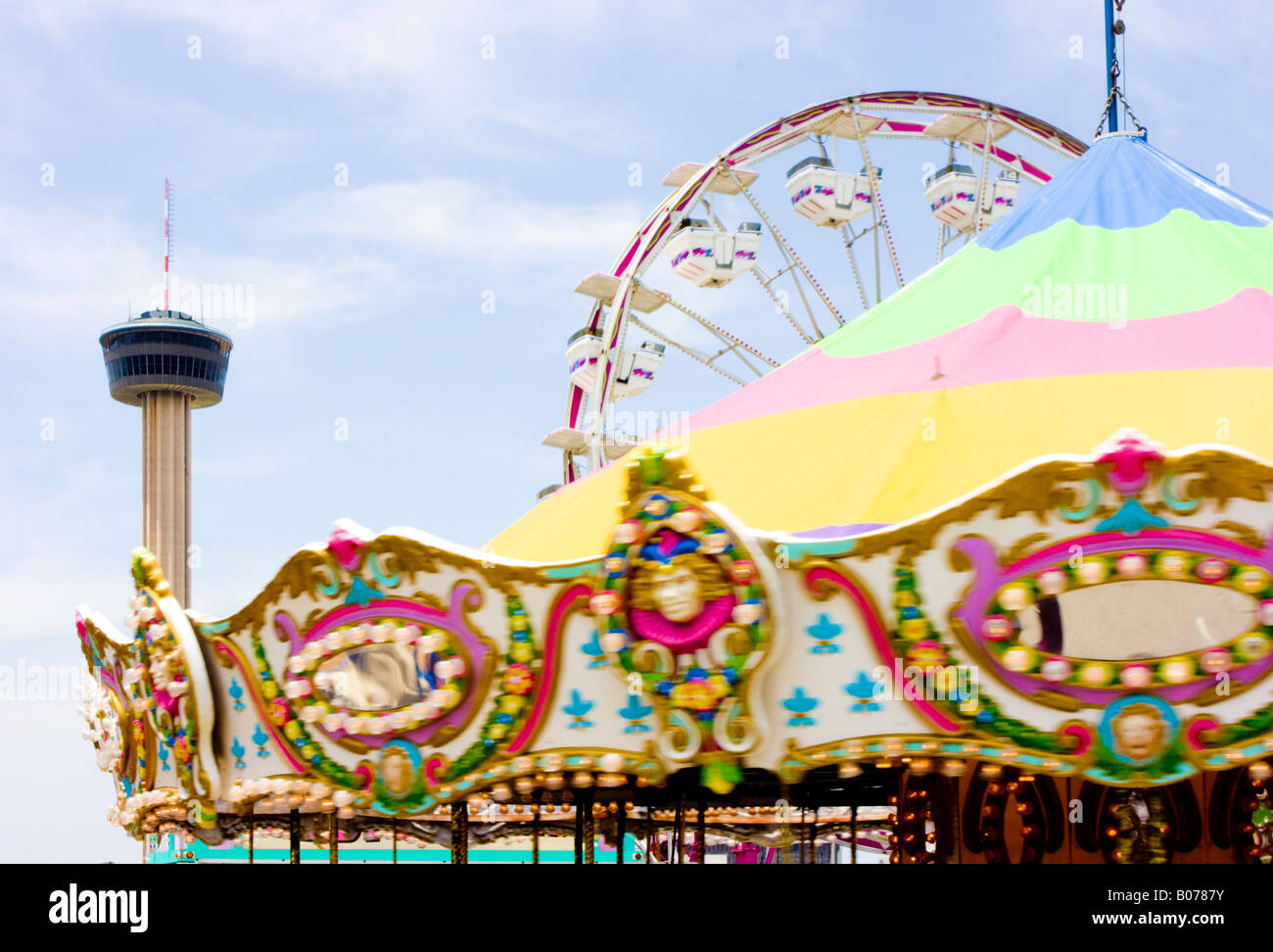 Fiesta carnival rides and Tower of Americas in San Antonio Texas Stock