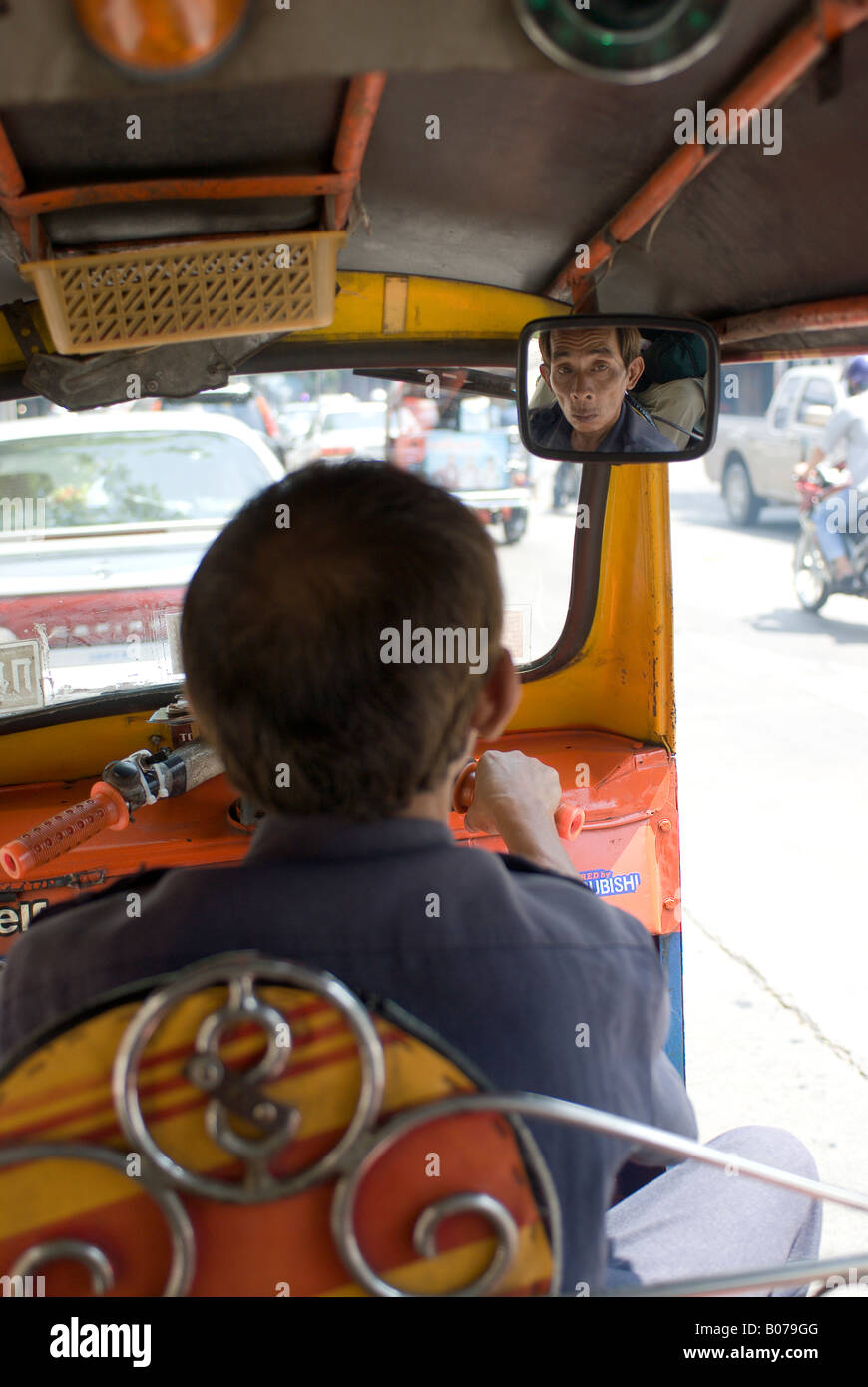 inside of tuktuk taxi in streets of Bangkok transportation close Stock Photo
