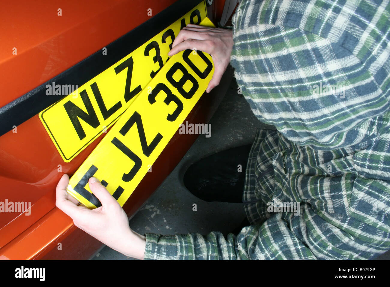 Car thief changing car number plates to disguise its true identity