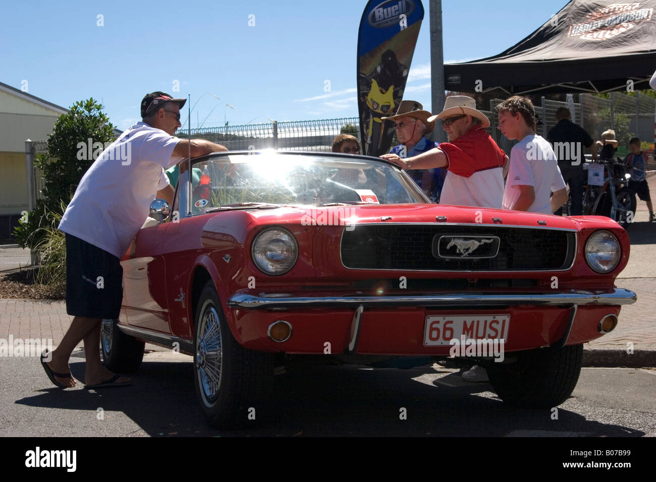 Classic car with enthusiasts Stock Photo Alamy