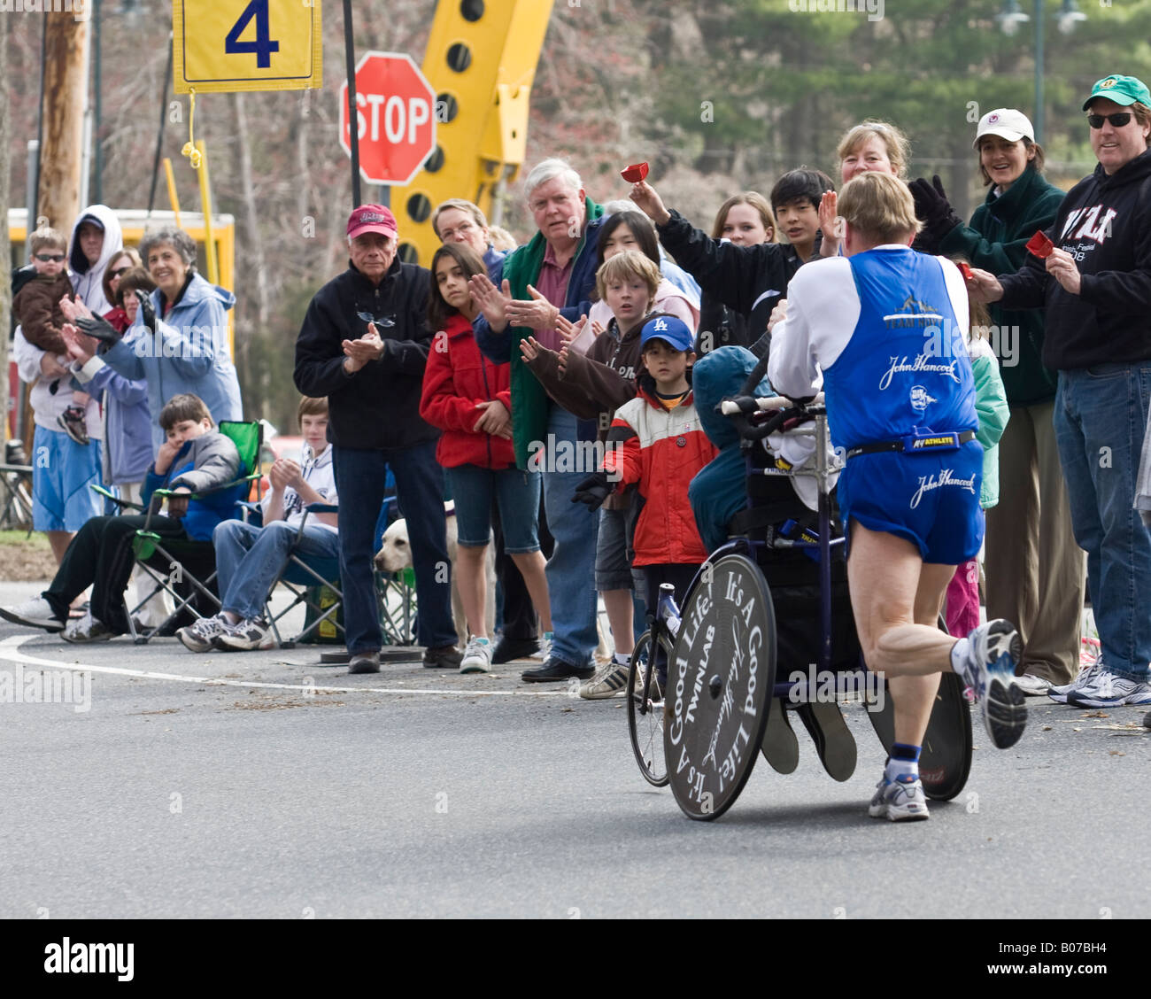 Crowd cheering handicapped racers at Boston Marathon 2008 Stock Photo