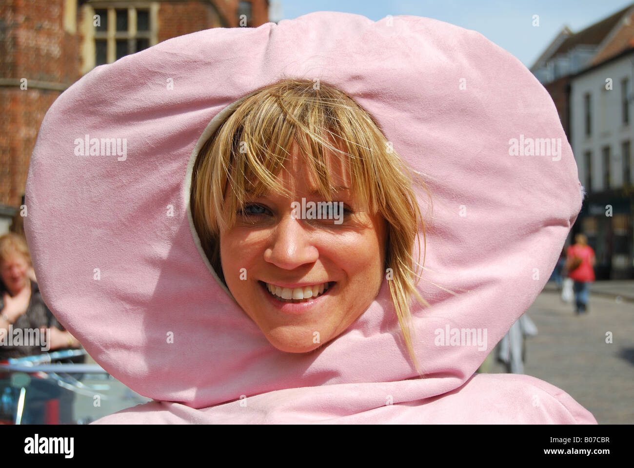 Charity collector in costume, High Street, Guildford, Surrey, England