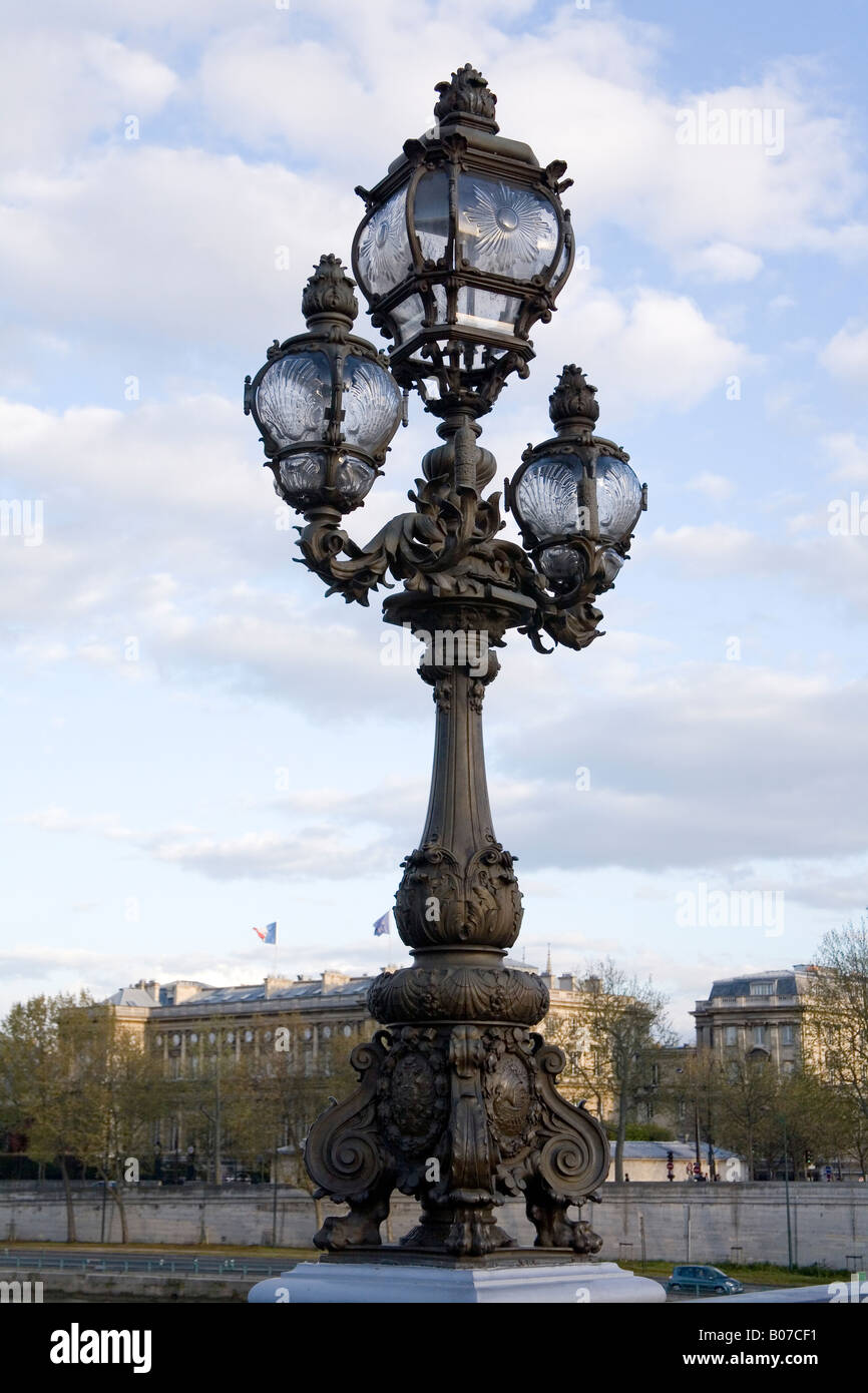 Ornate lamp posts on Pont Alexandre lll bridge, Paris, France Stock Photo