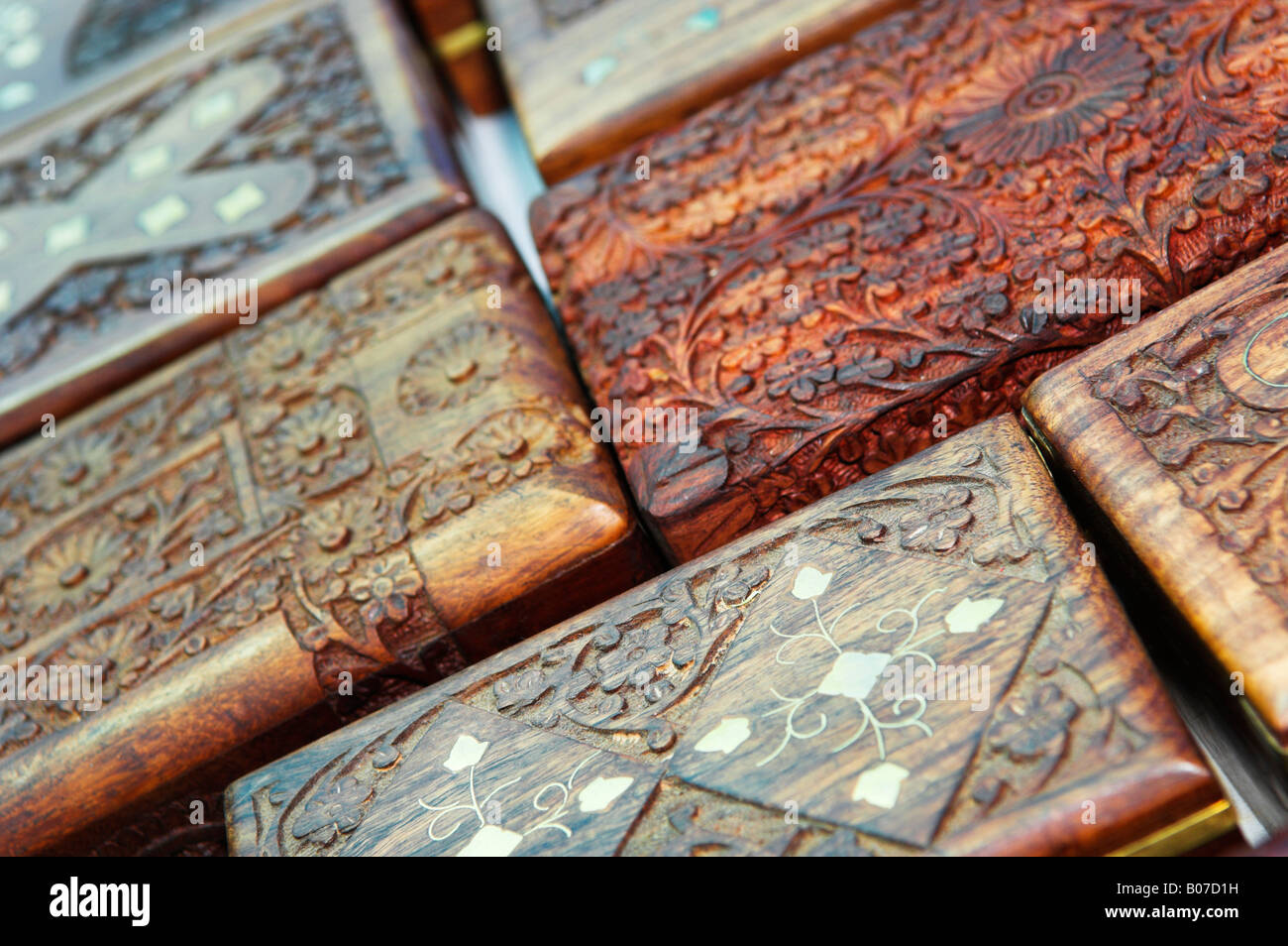 Closeup of traditional hand carved Indian wooden souvenir boxes Stock