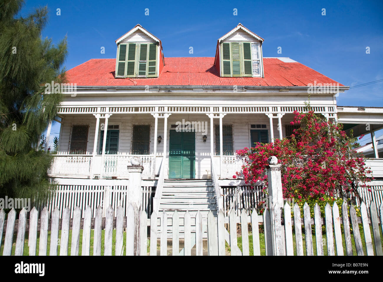 Belize, Belize City, Wooden houses lining Memorial park Stock Photo