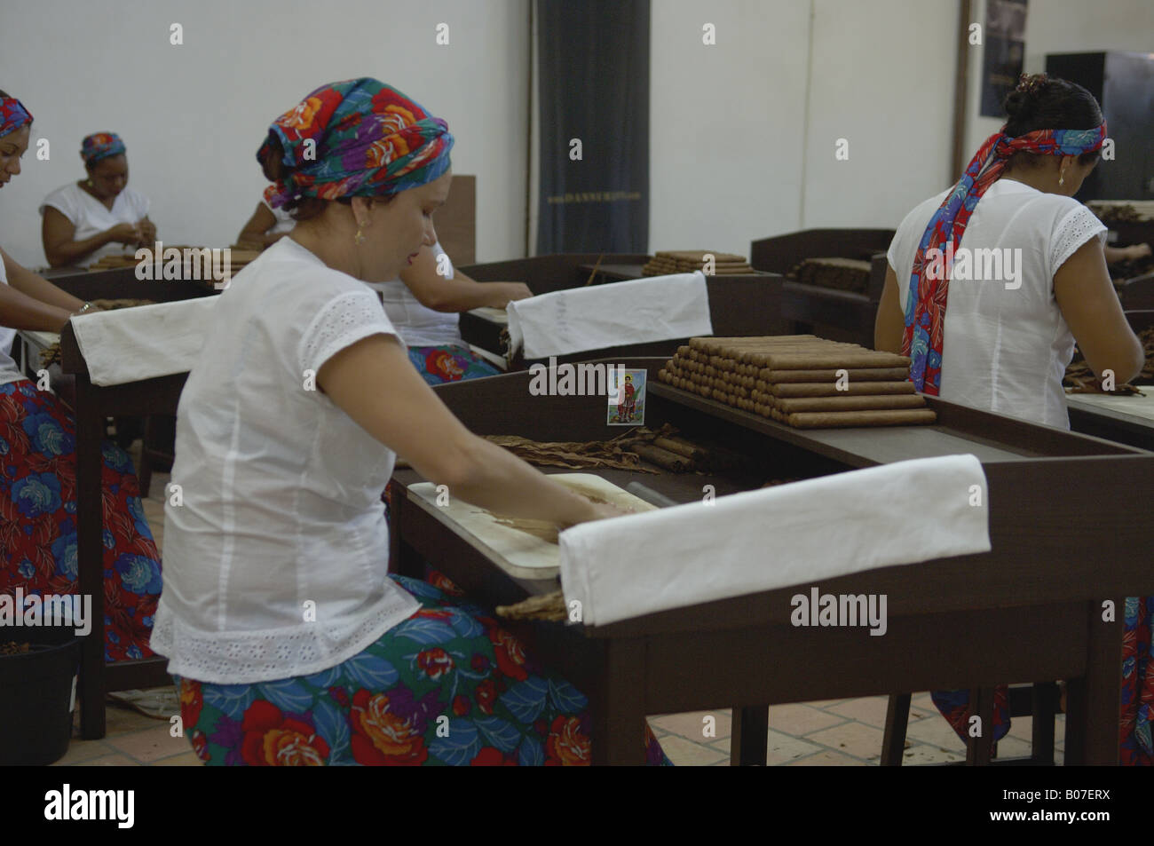 Women working in the hand-made cigars factory in Sao Felix city in Bahia, a northeastern State in Brazil. Stock Photo