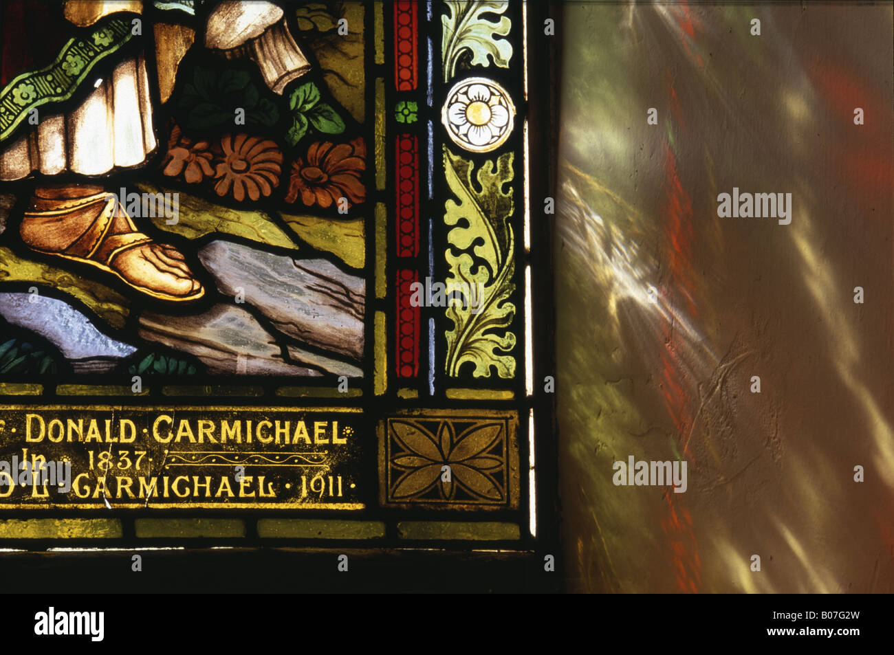 Light spilling through stained glass window, St Moluags Church Lismore