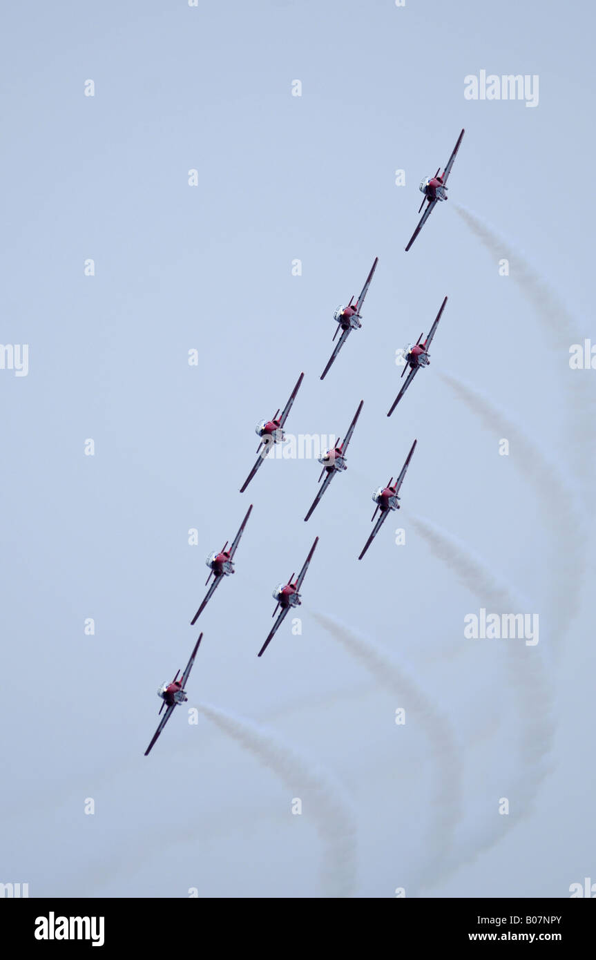 The Canadian Snowbirds aviation nine plane display team in practice over the Comox Forces Base Vancouver Island British Columbia Stock Photo