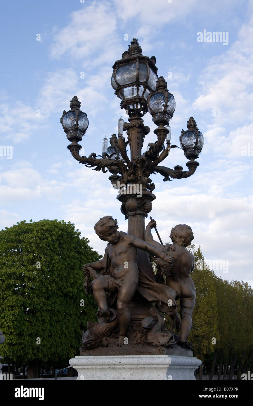 Ornate lamp posts on Pont Alexandre lll bridge, Paris, France Stock Photo