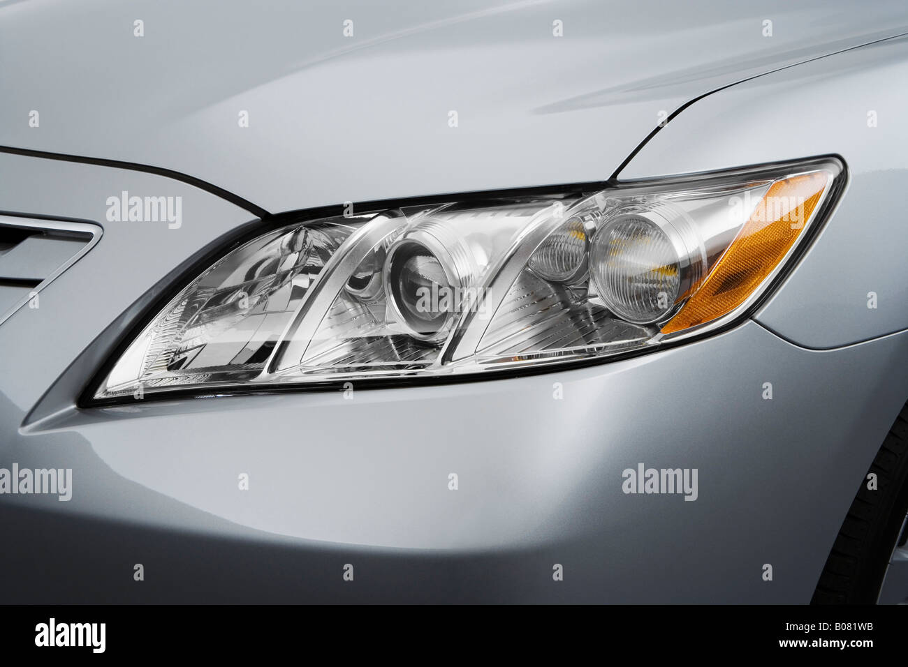 2008 Toyota Camry XLE in Gray - Headlight Stock Photo
