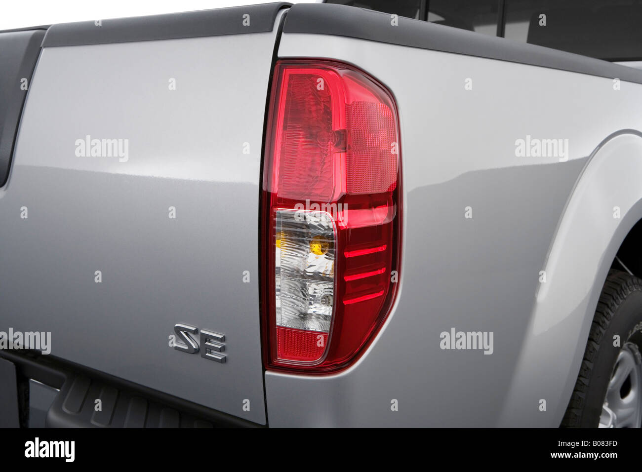 2008 Nissan Frontier SE in Silver - Tail light Stock Photo - Alamy