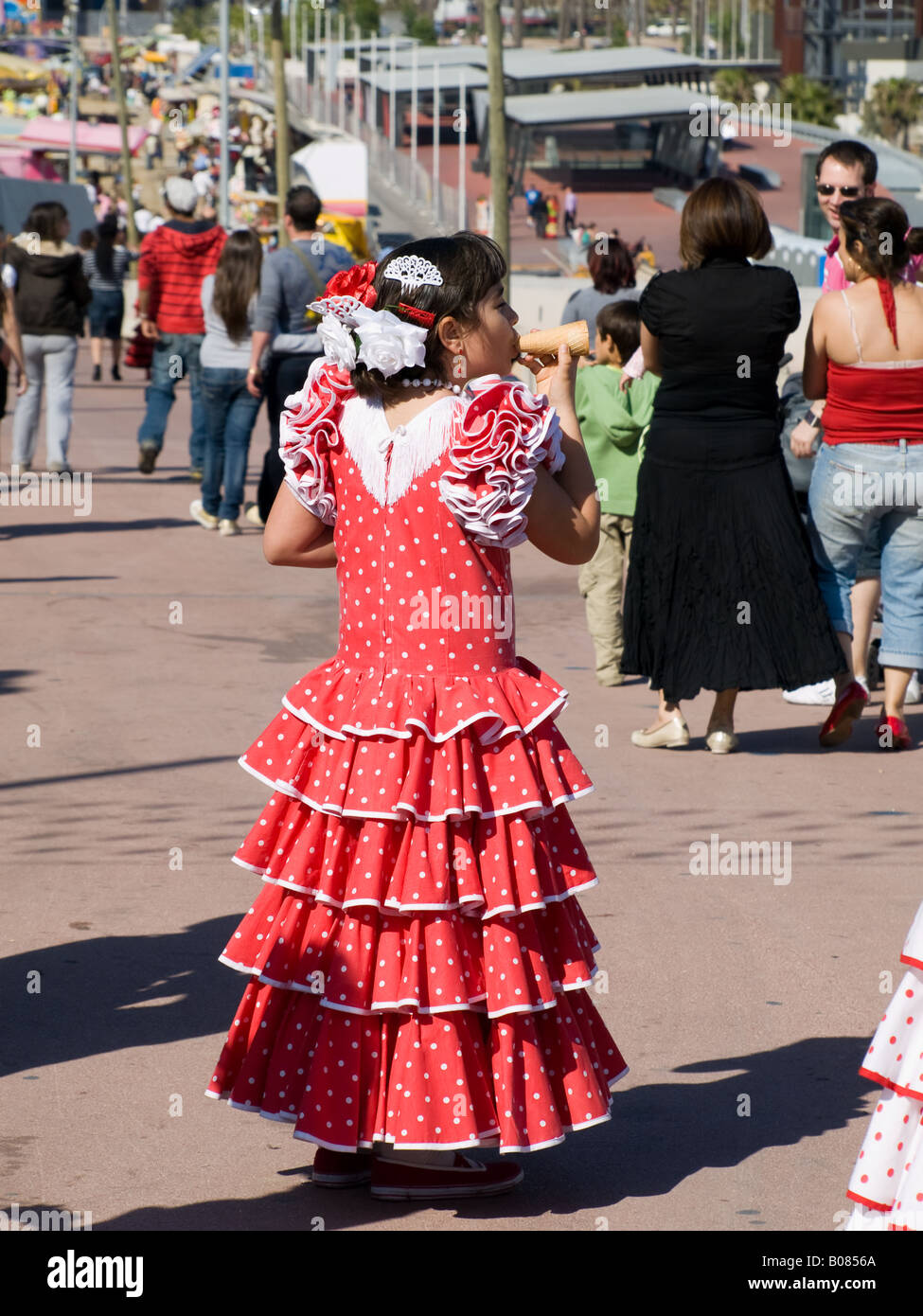 Spanish girl in traditional Spanish dress at the April fair in Barcelona  Stock Photo - Alamy