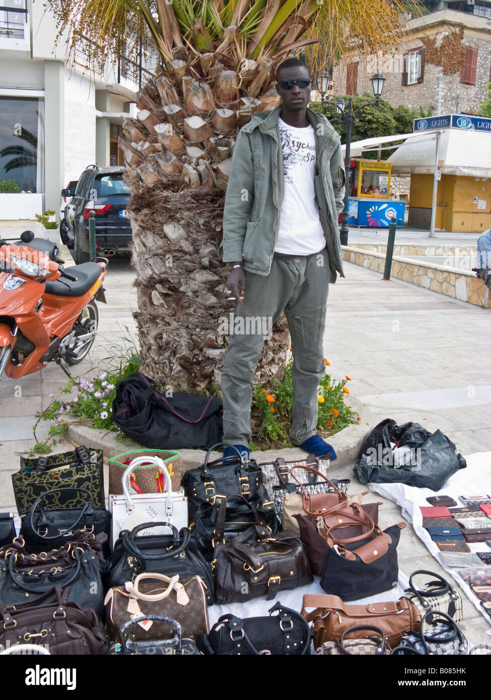 Selling Fake Bags On The Street Rome Italy Stock Photo - Download