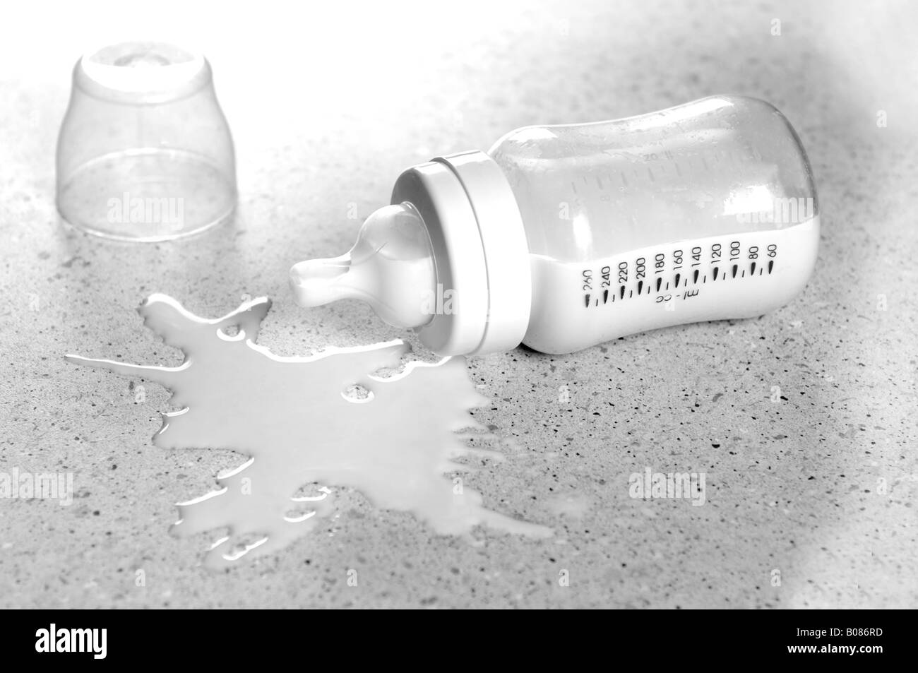 a spilt bottle of baby formula Stock Photo