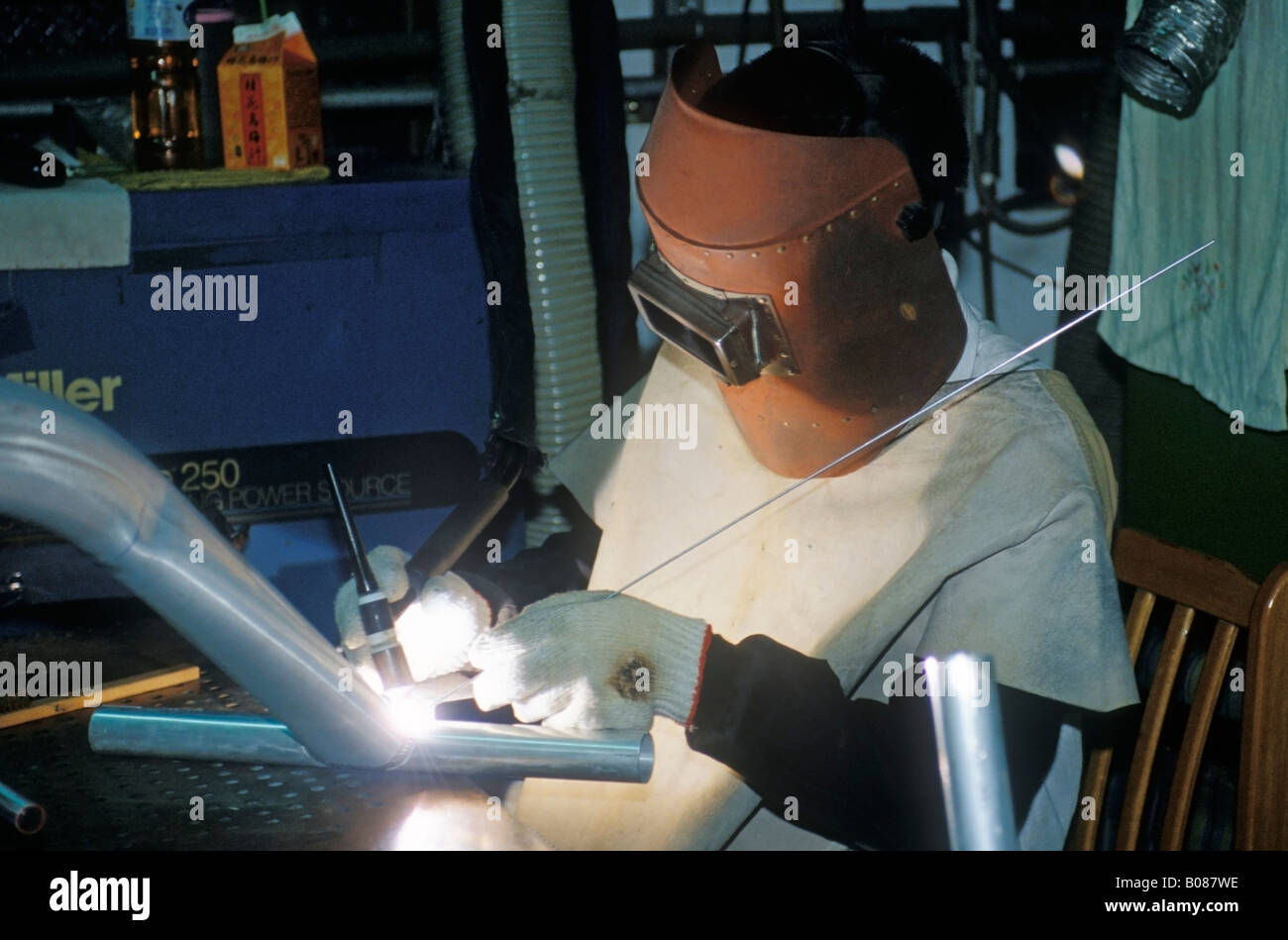 Man Welding And Manufacturing A Bicycle Frame Taiwan Stock Photo