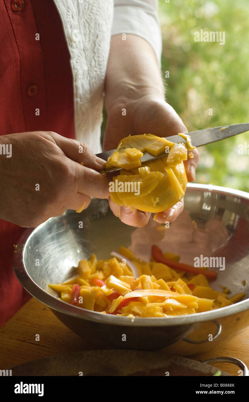 Preparing a mango Stock Photo Alamy