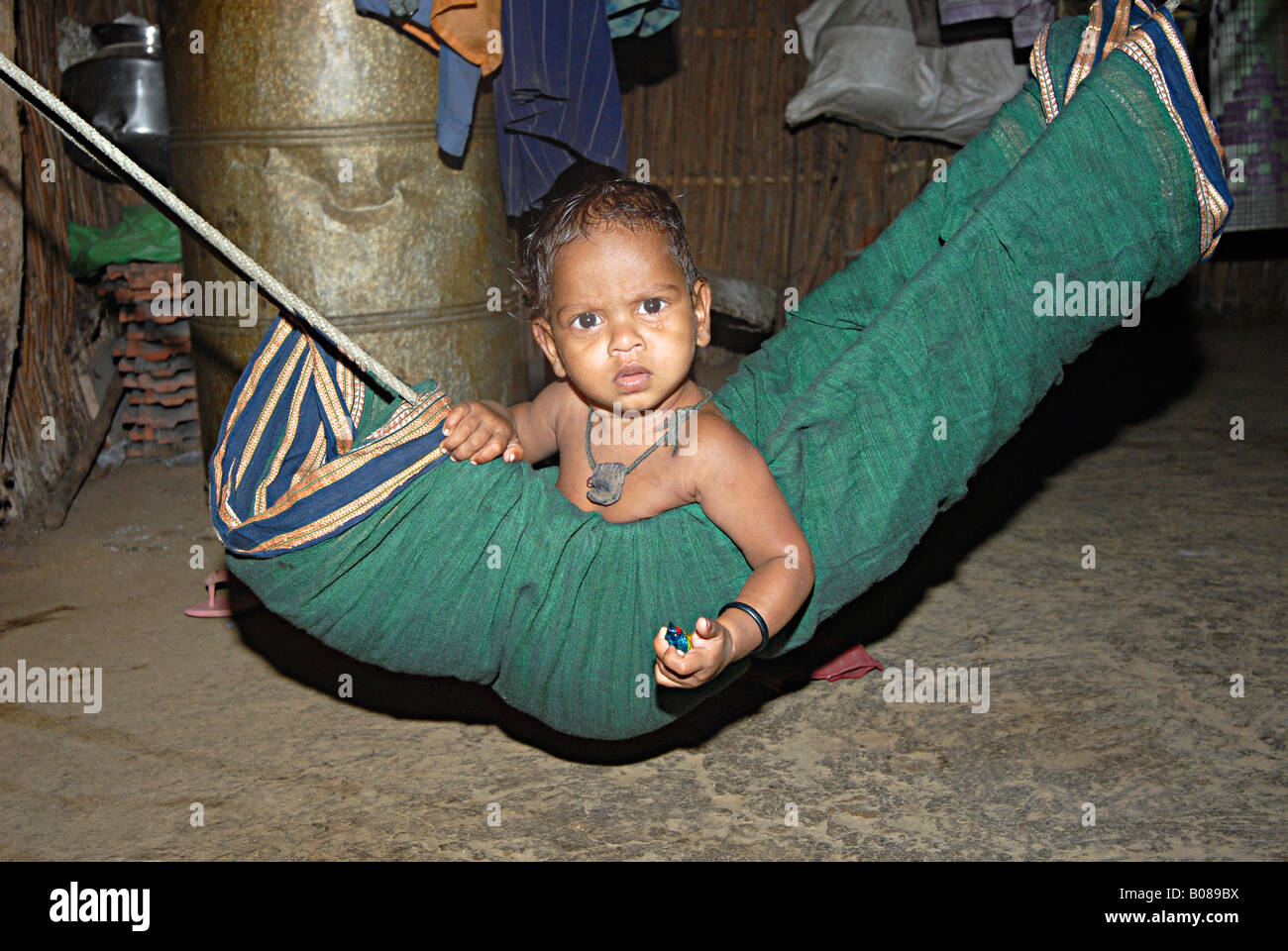 Baby in a Hammock. Katkari tribe Stock Photo