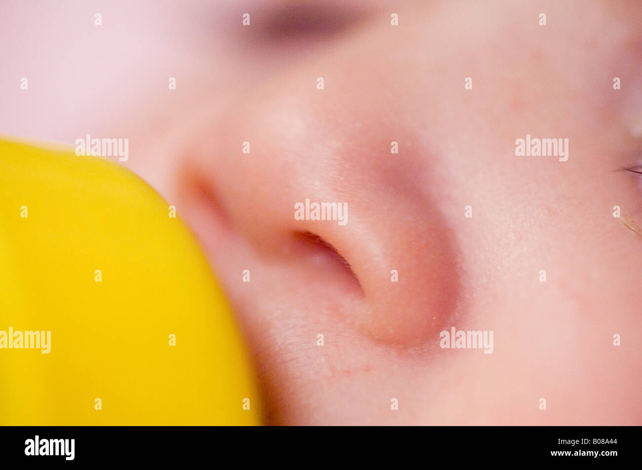 Baby sleeping with bottle in mouth Stock Photo Alamy