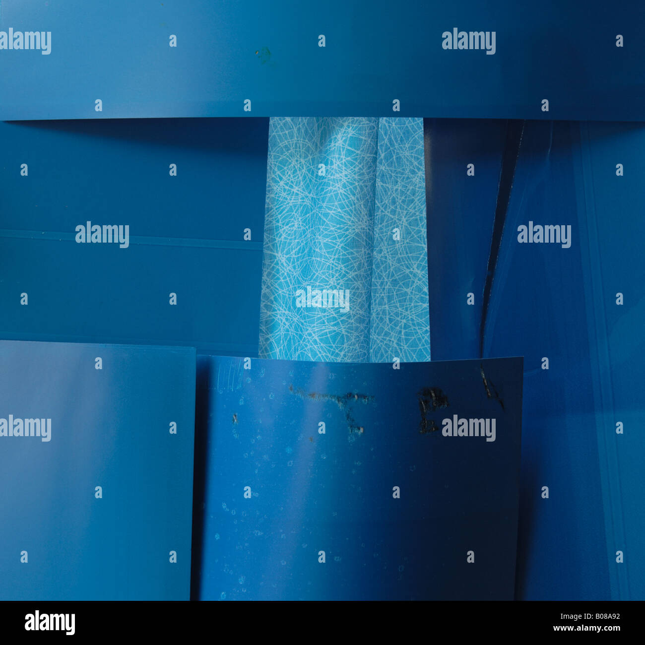 collage of blue printer blotting papers with a fabric center suitable