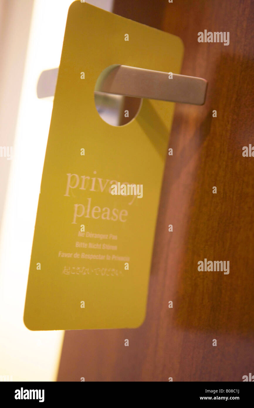 Do not disturb sign on doorknob Stock Photo - Alamy