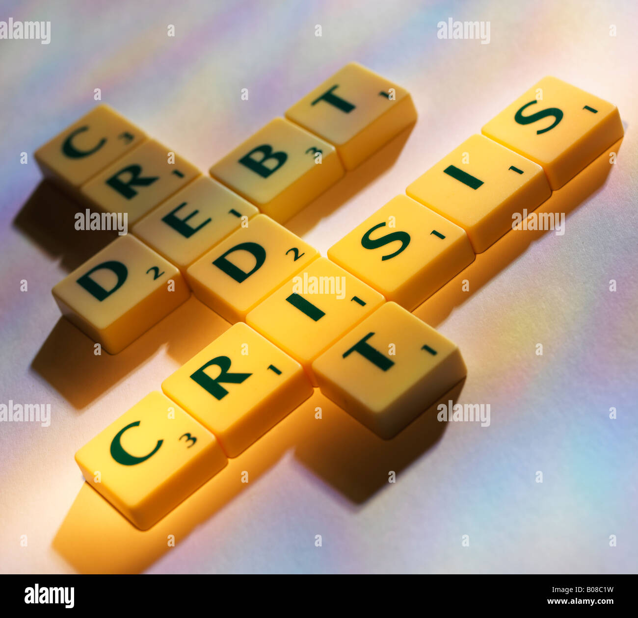SCRABBLE  LETTERS SPELLING THE WORDS CREDIT CRISIS DEBT Stock Photo