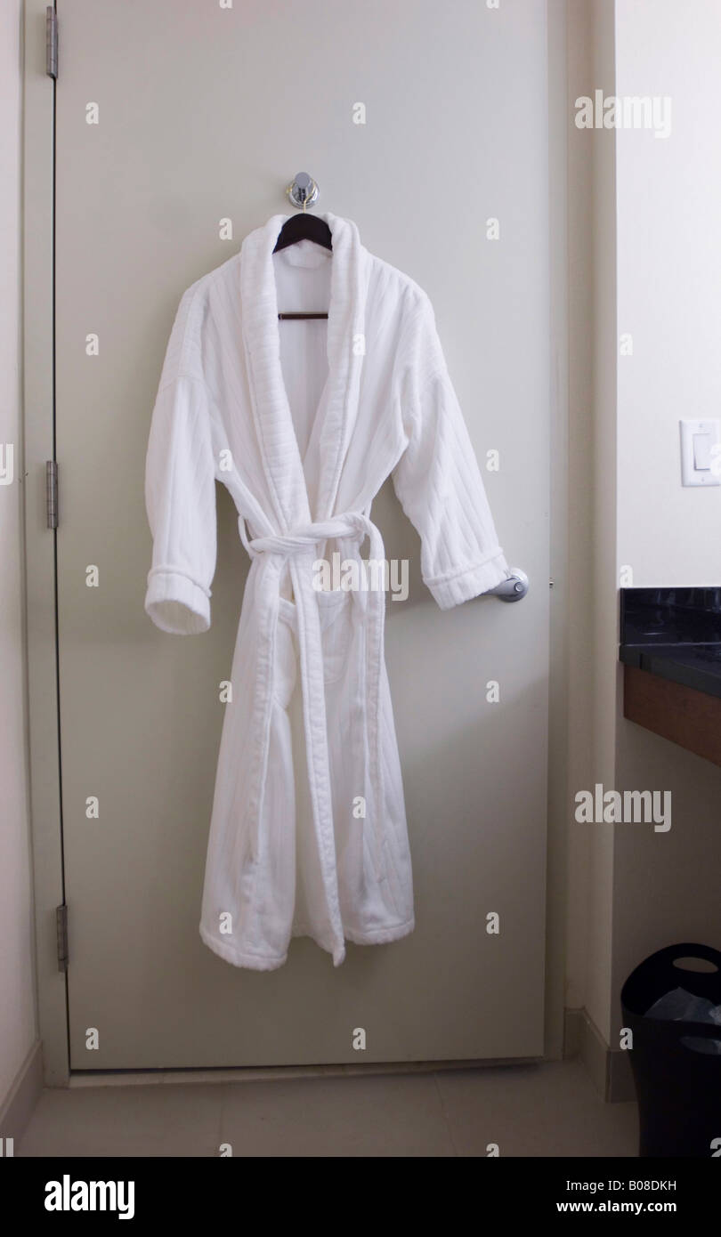 Robe hanging behind door Stock Photo Alamy