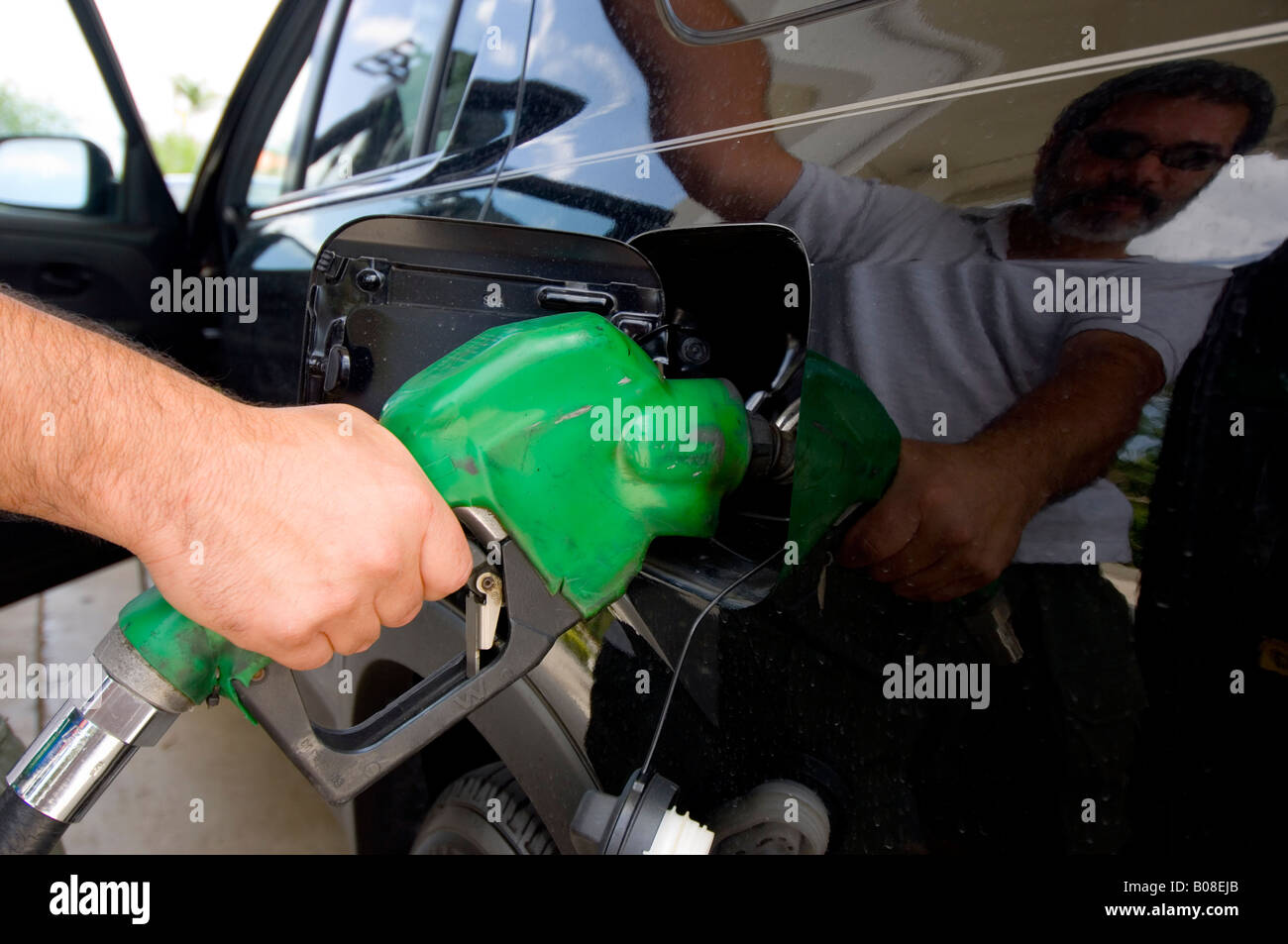 Man pumping gas Stock Photo Alamy