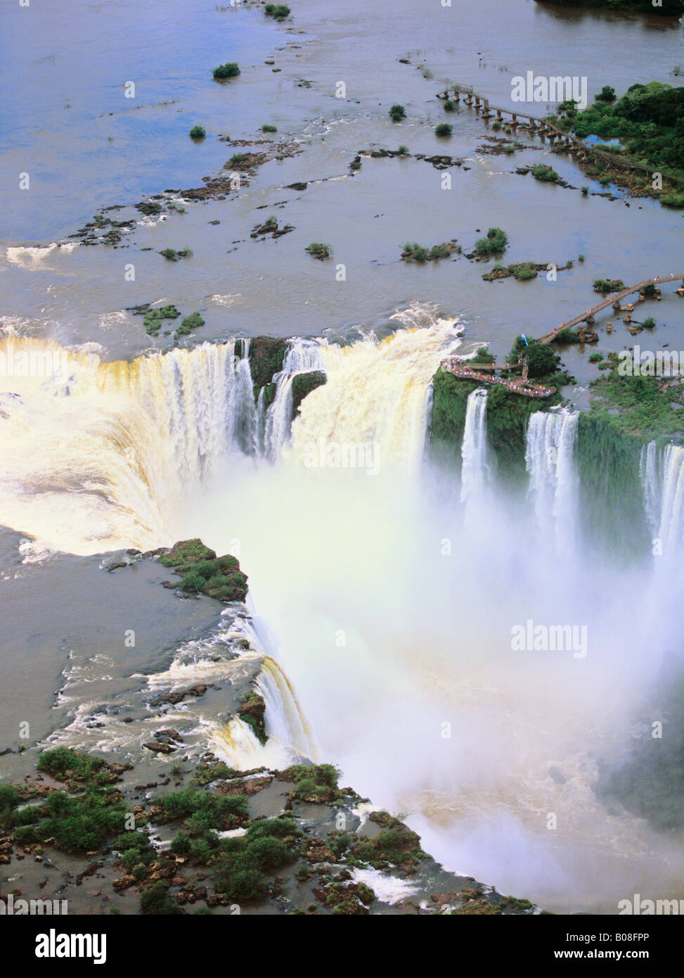 South America, Brazil, Argentina, Igwazu Falls. Igwacu Falls thunder into the Igwacu River below. Stock Photo