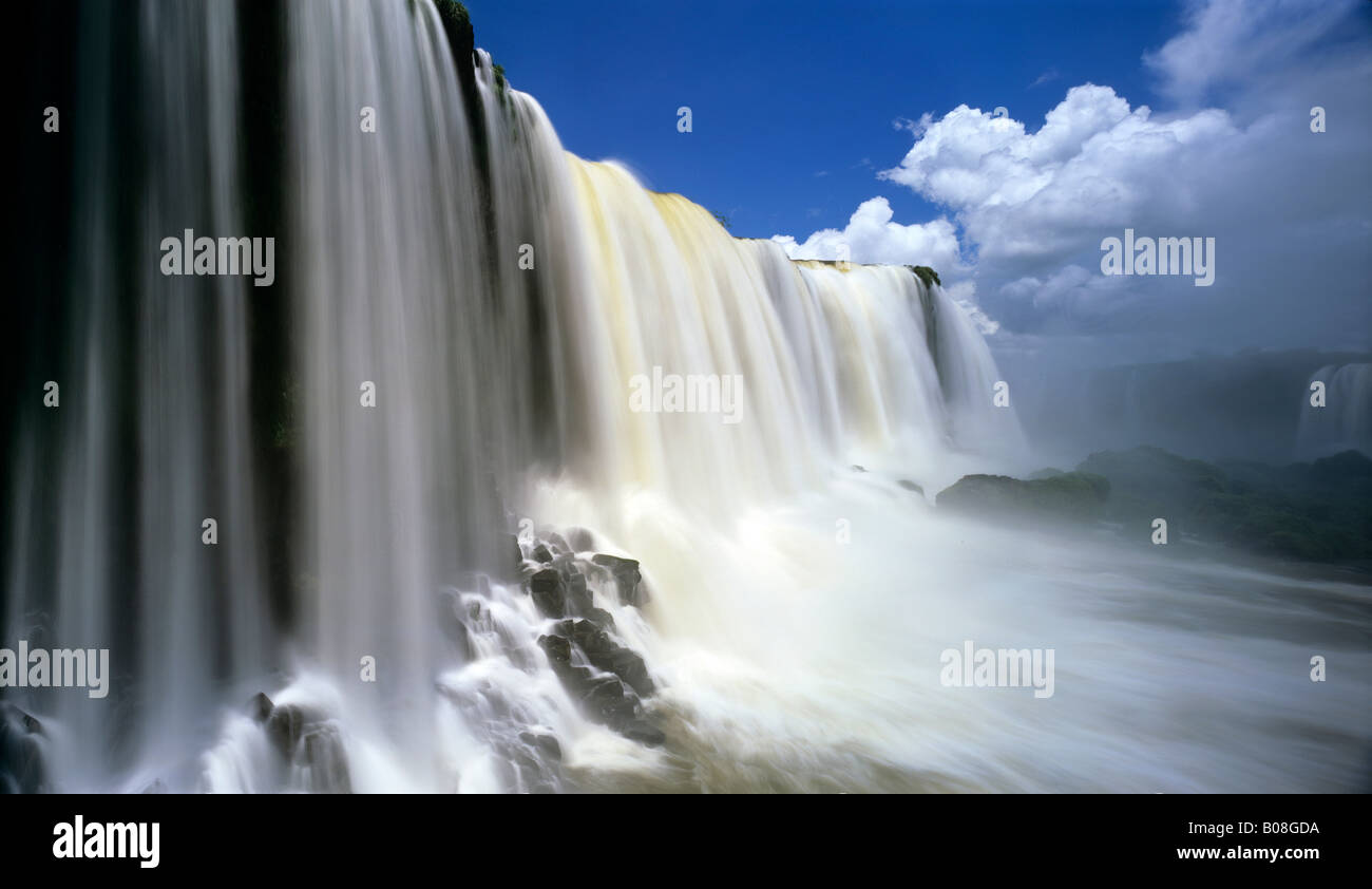 South America, Brazil, Igwacu, Igwacu Falls. Towering Igwacu Falls drops into the Igwacu River. Stock Photo
